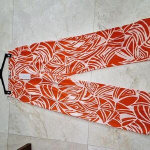 Bright orange printed wide leg pants